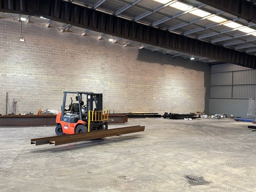 Empty warehouse before the Momentum Health + Fitness fit-out